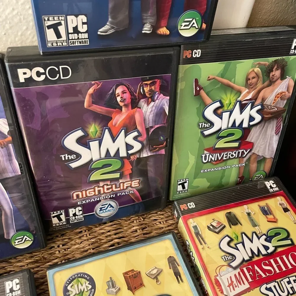 The SIMS PlayStation Vintage Side Video Game Lot PC DVD Pets Family Delux Sets